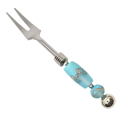 "Image of a handcrafted glass bead appetizer fork, showcasing exquisite artisanal craftsmanship and elegant design."